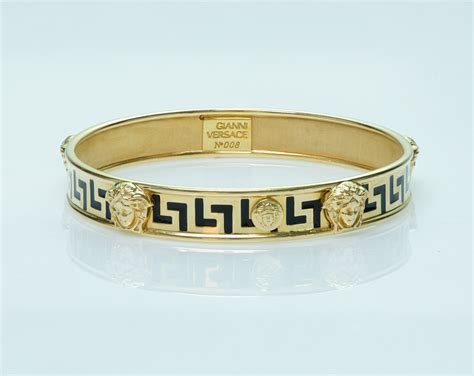 versace gold bangle bracelet.